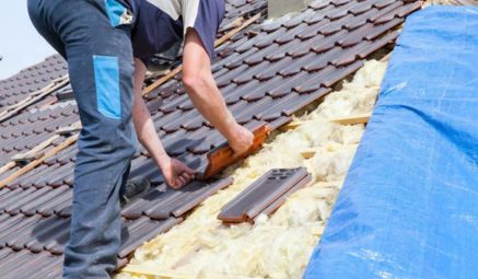 Roofing materials arranged neatly for installation during a service project.